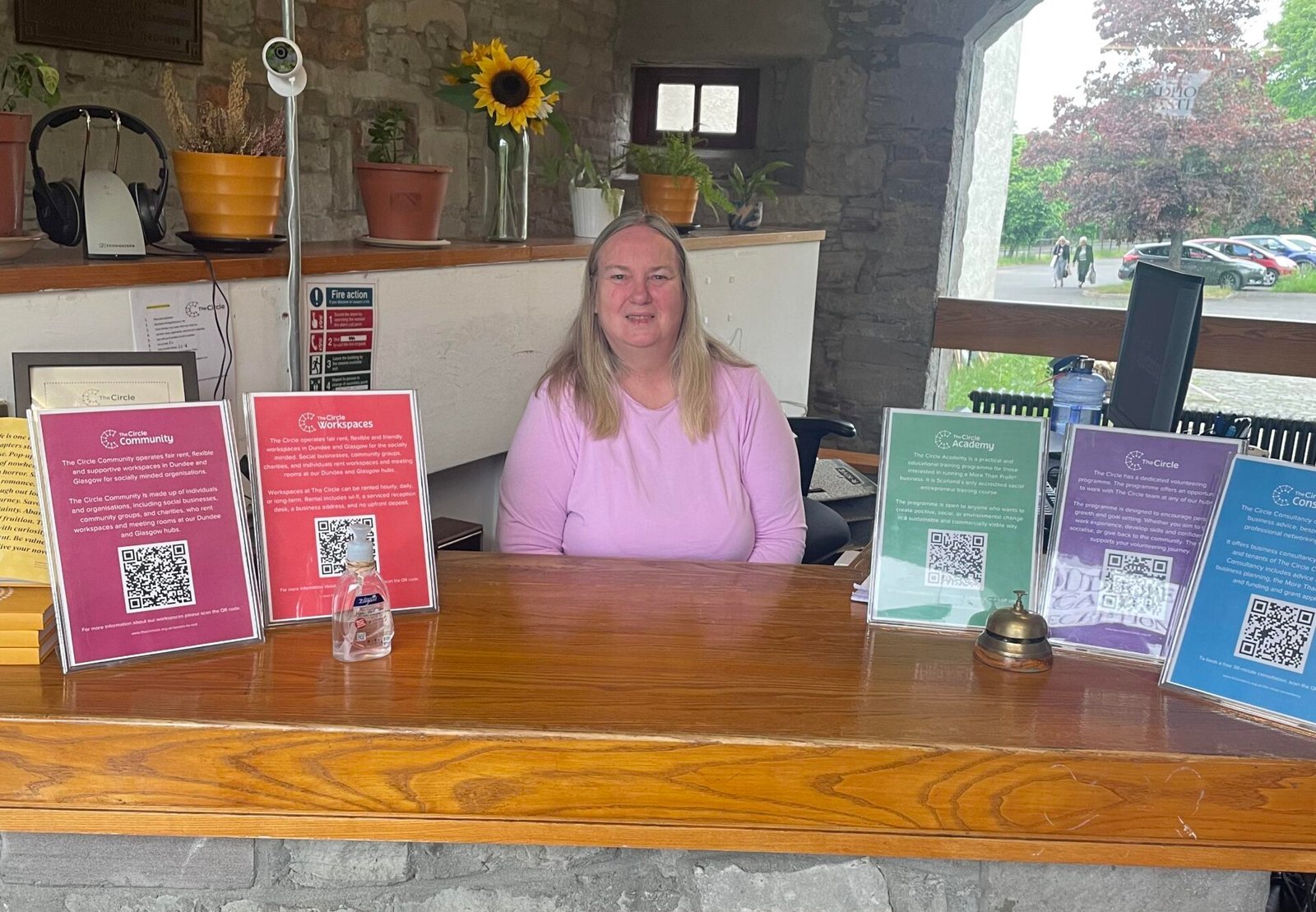 Margaret, a Circle volunteer, on the reception desk at Dudhope Castle